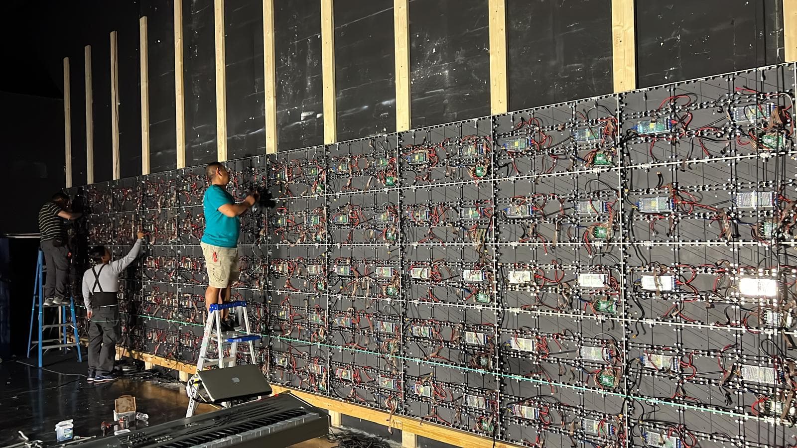LED canvas installation in progress inside church worship space